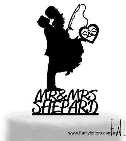 carrying fishing couple cake topper